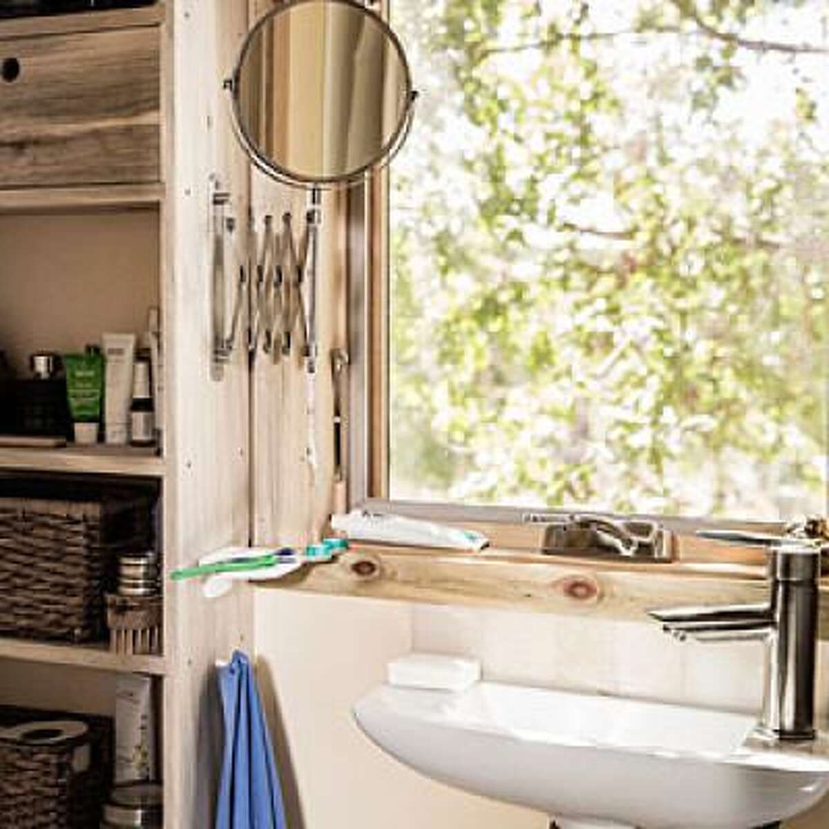 Be shallow Alek Lisefski's entire living space is only 240 square feet-he lives in a tiny house he built himself near Sebastopol, California. The bathroom is the smallest room in the house and it's only made possible by the shallow sink (it's the Isabella sink from Whitehaus) and equally shallow built-in shelves that line the wall. Read more: 9 bathroom storage solutions
