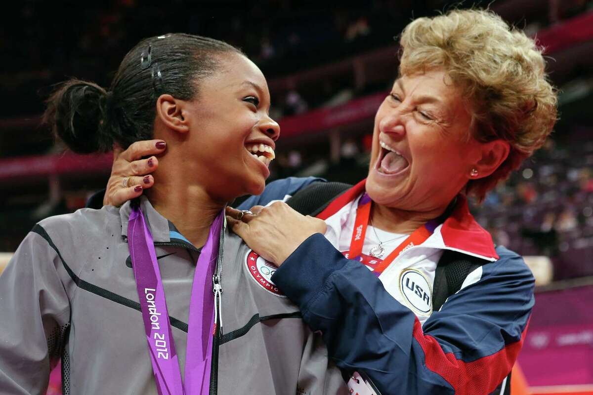 Gabby Douglas, left, is one of nine Olympic champions Martha Karolyi has helped train.﻿