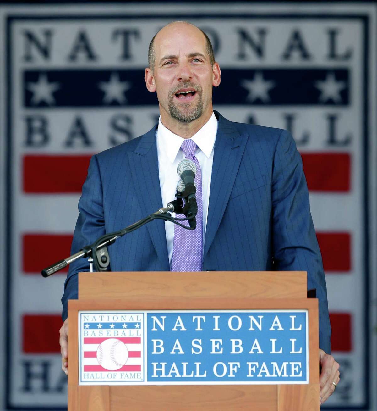 National Baseball Hall of Fame inductee John Smoltz speaks during an induction ceremony at the Clark Sports Center on Sunday, July 26, 2015, in Cooperstown, N.Y. (AP Photo/Mike Groll) ORG XMIT: NYMG113