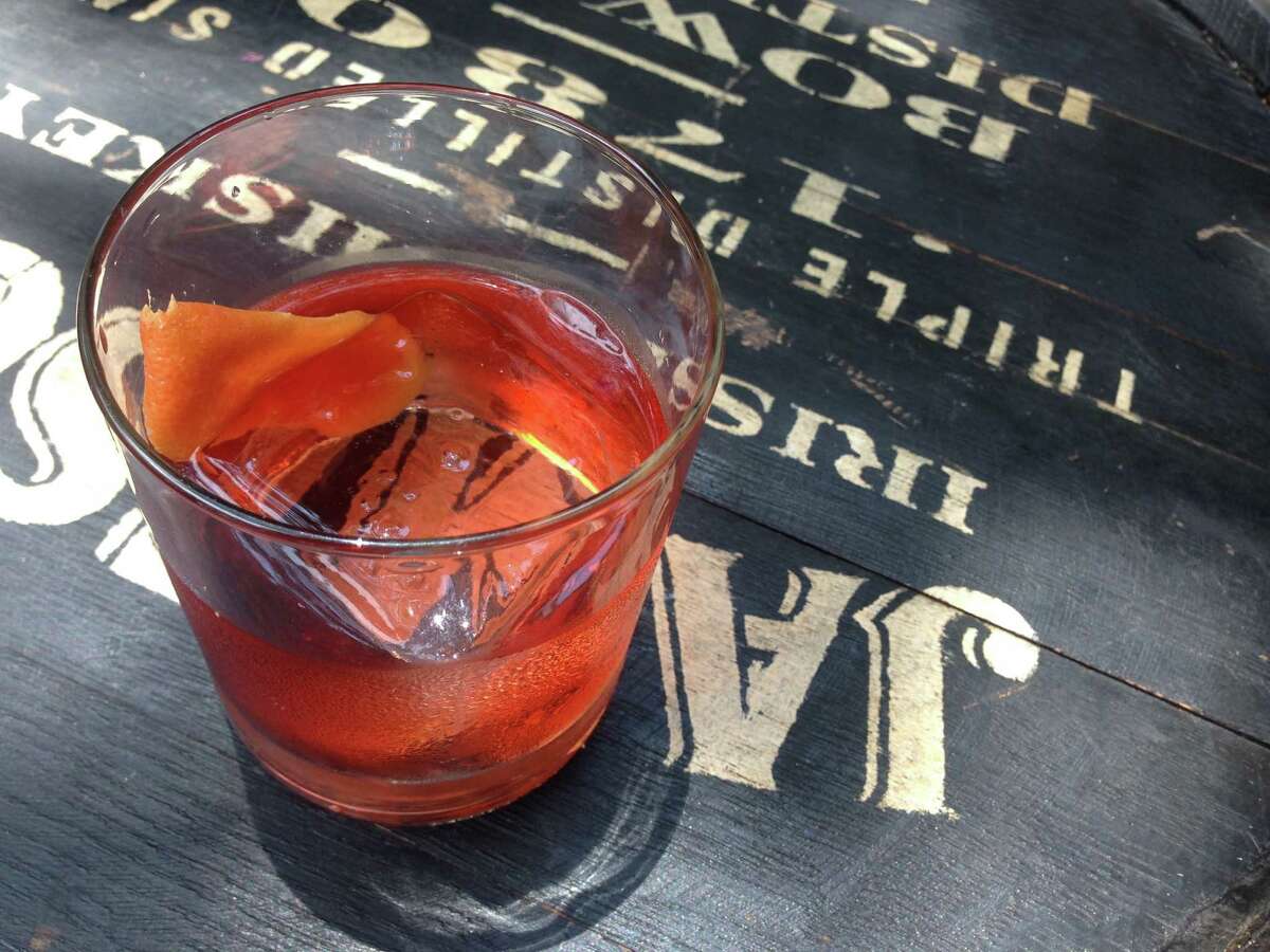 Broadway Junction is a cocktail made with Jameson Black Barrel, bitters and Campari. It was served during 2015 Tales of the Cocktail in New Orleans.