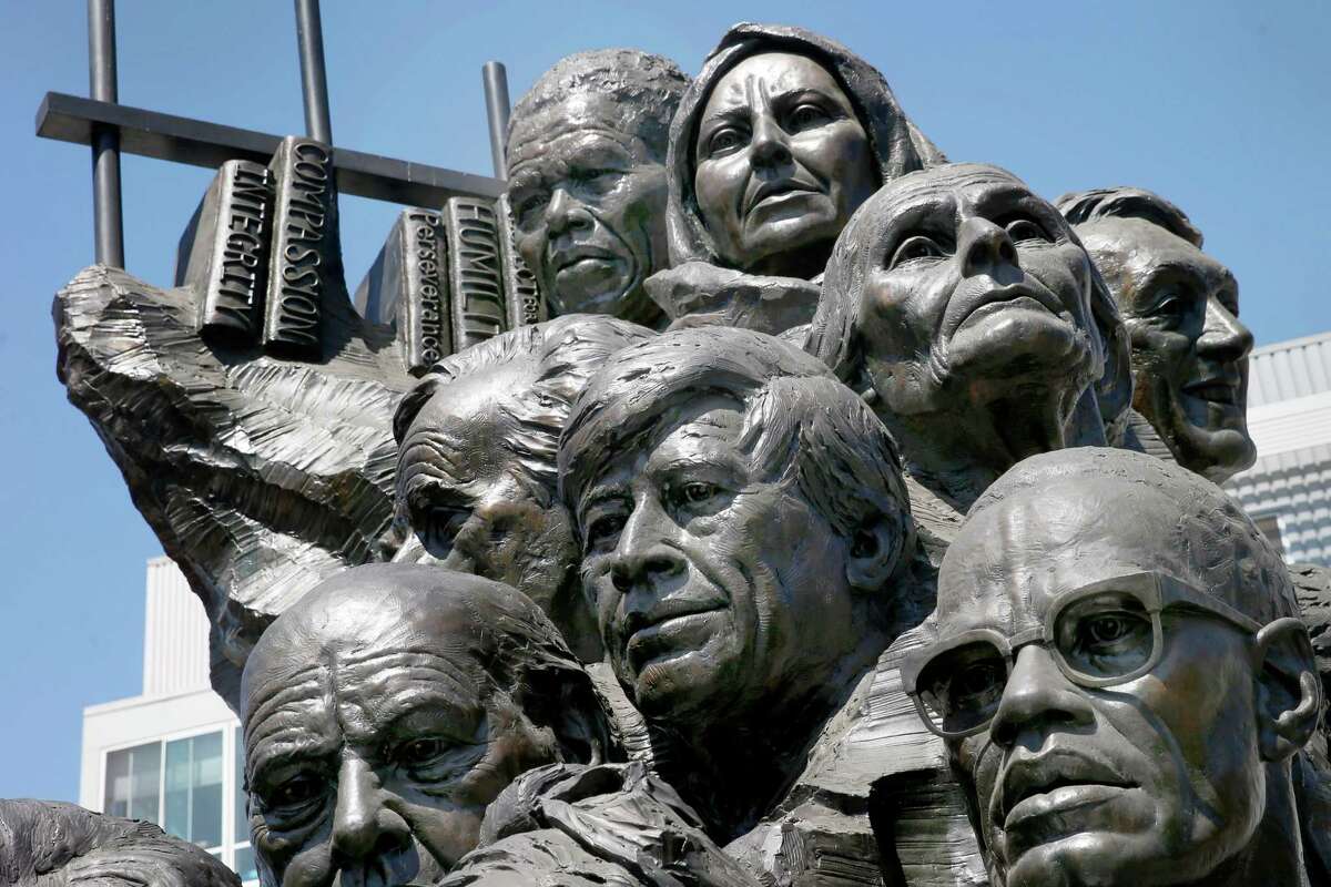 A detail from one of the panels of the “Remember Them” sculptures by Mario Chiodo in Henry J. Kaiser park in the Uptown district of Oakland.