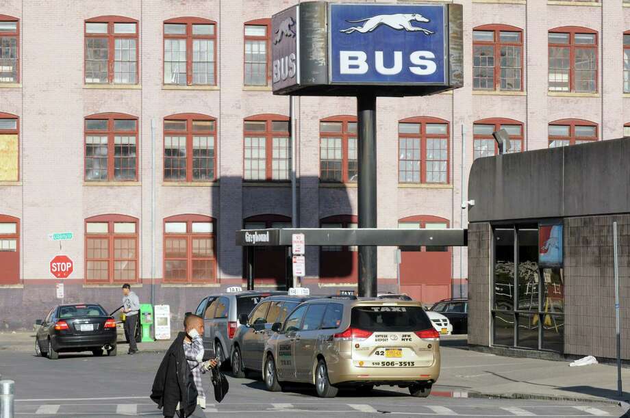 Taxis wait for passenger pick up at the Greyhound Bus terminal on Tuesday April 28, 2015 in Albany, N.Y. (Michael P. Farrell/Times Union) ORG XMIT: MER2015042820064382 Photo: Michael P. Farrell / 00031637A