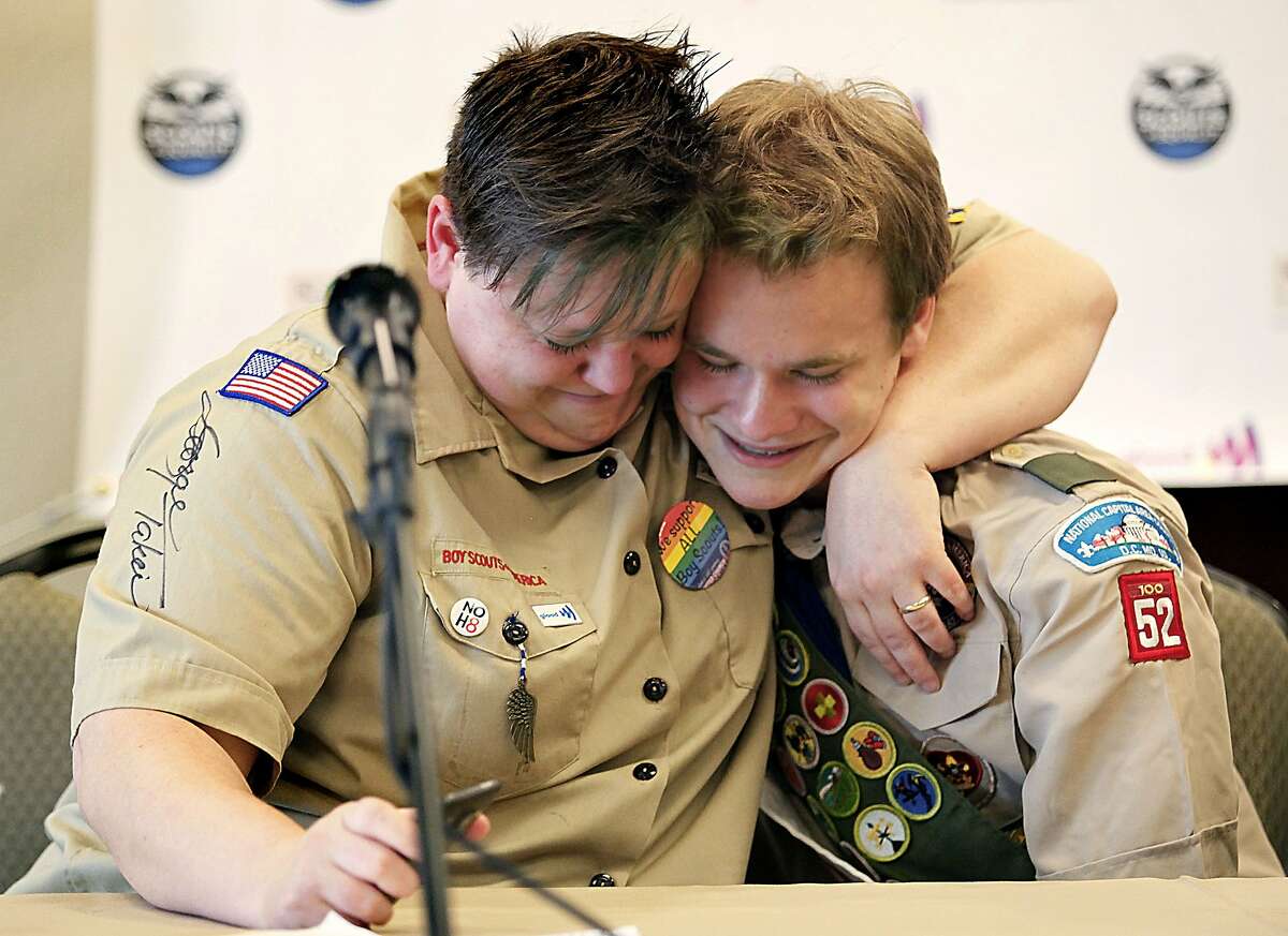 FILE - JULY 27, 2015: According to reports, the governing board of the Boy Scouts of America has voted to end its ban on gay troop leaders and employees. GRAPEVINE, TX - MAY 23: Jennifer Tyrrell of Bridgeport, Ohio, hugs Pascal Tessier, 16, of Kensington, Maryland, at a news conference held at the Great Wolf Lodge May 23, 2013 in Grapevine, Texas. The Boy Scouts of America today ended its policy of prohibitting openly gay youths from participating in Scout activities, while leaving intact its ban on gay adults and leaders. Jennifer was kicked out of the scouts as a Cub Scout den leader in 2012 for being openly gay. Pascal was told by Scout leaders that since he was openly gay he could not attain the Eagle Scout rank, but was permitted to remain a Scout. After today's decision, he will be able to resume his pursuit of the Eagle Scout rank. (Photo by Stewart House/Getty Images)