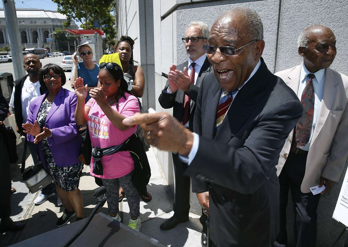 Rev. Amos Brown, pastor of the Third Baptist Church, comments at a news conference outside of the SF Superior Courthouse in San Francisco, Calif. on Tuesday, July 28, 2015. Attorneys for the church asked a Superior Court judge to issue a restraining order against the landlord of the Frederick Douglas Haynes Gardens low income apartments from selling the property to speculators.