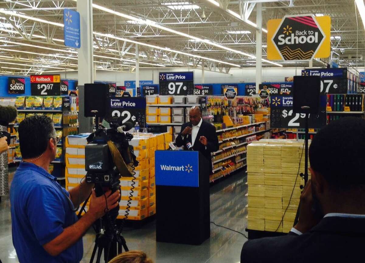 State Sen. Rodney Ellis, D-Houston, discusses the state sales tax holiday for back-to-school purchases after the opening of a new Walmart on South Rice Avenue near Westpark Drive. Ellis, who authored the original bill that created the holiday in 1999, said he will continue to work toward amending and expanding the sales tax holiday and calls on shoppers to contact their legislators.
