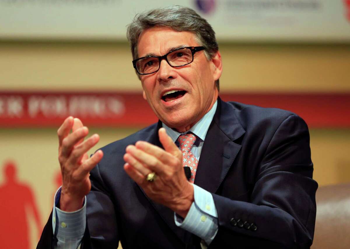 FILE - In this July 18, 2015, file photo, Republican presidential candidate, former Texas Gov. Rick Perry, speaks at the Family Leadership Summit in Ames, Iowa. As next month?’s first GOP 2016 presidential debate looms, prospects are doing everything they can to improve their polling and chin themselves into a top 10 position to meet the criteria set by Fox News Channel to appear on stage Aug. 6 in Cleveland. Perry is waging a one-man war on Donald Trump?’s credibility, calling the bombastic billionaire ?“a cancer on conservatism.?” Former Pennsylvania Sen. Rick Santorum, a conservative icon, popped up on a favorite program of liberals, the Rachel Maddow Show. And South Carolina Sen. Lindsey Graham set his phone on fire. (AP Photo/Nati Harnik, File)