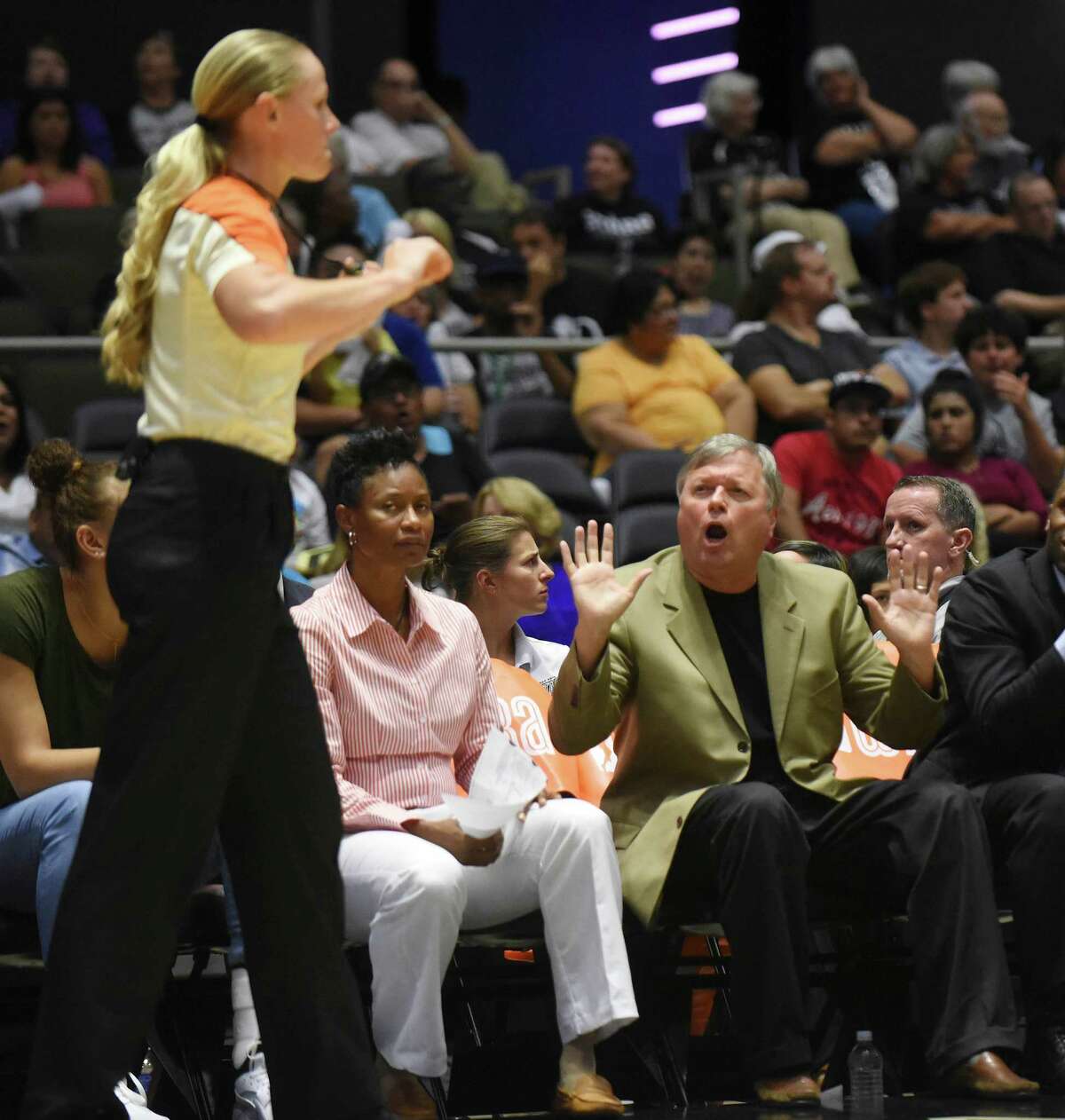 San Antonio Stars head coach Dan Hughes motions to official Tiffany Bird during WNBA action against Atlanta at Freeman Coliseum on Wednesday, July 29, 2015.