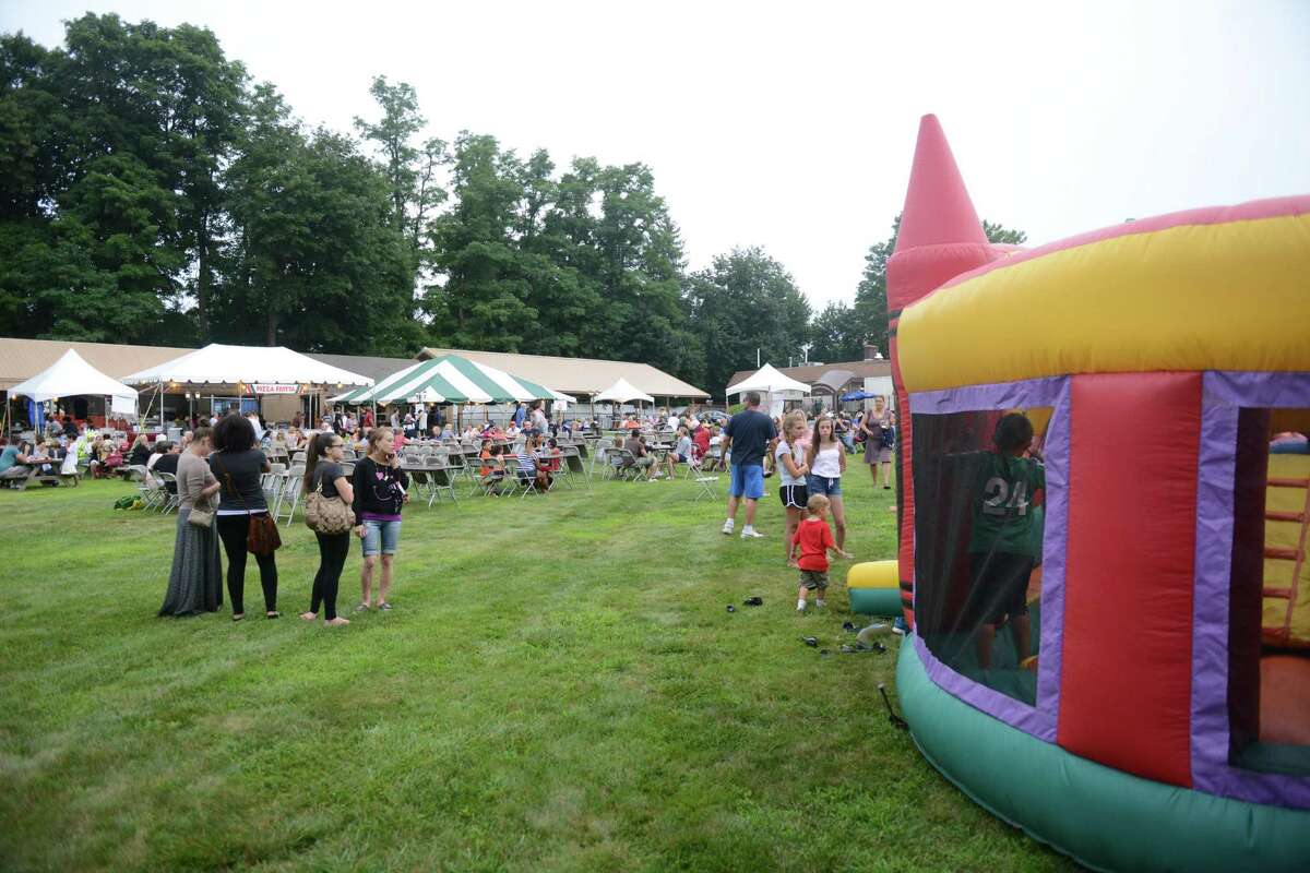 The annual Italian Festival at the Amerigo Vespucci Lodge in Danbury returns on Friday, July 31, for a full weekend of activities. Here, hundreds of guests enjoy the festival in 2014. The event will feature an array of authentic Italian food, live music, a classic car show and activities for children.