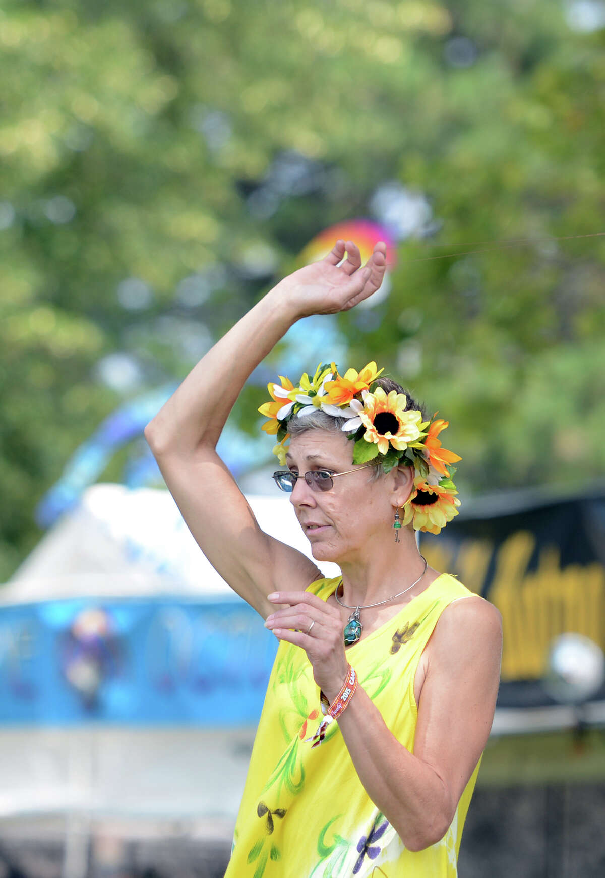 Tara Prindle, of Vernon, dances on the opening day of the 20th annual Gathering of the Vibes music festival Thursday, July 30, 2015 at Seaside Park in Bridgeport, Conn.