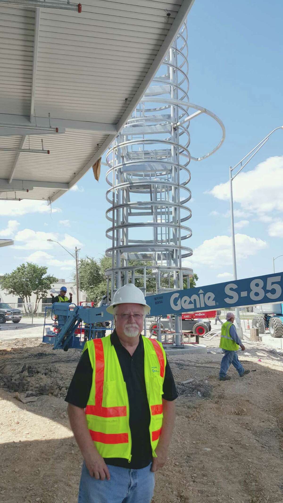 Bill FitzGibbons stands near the site of his new public art project, "Centro Chroma Tower." The lighted sculpture will stand 85 feet high.