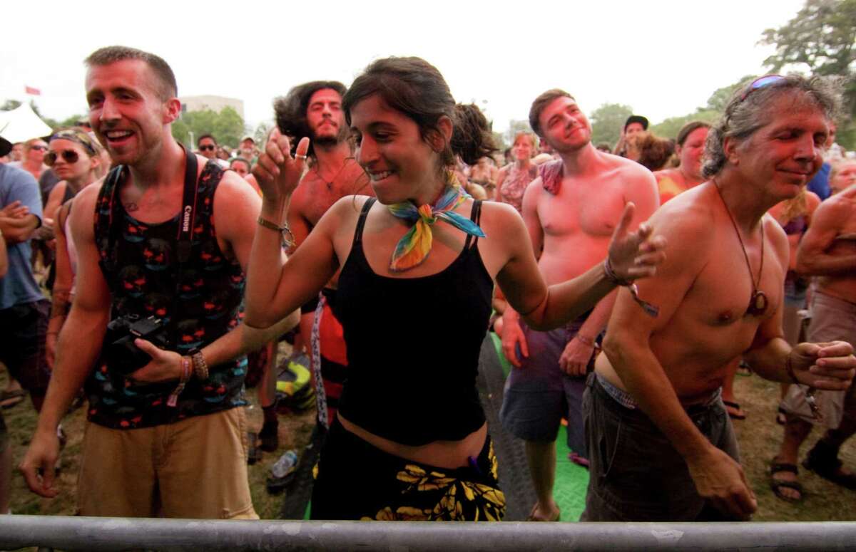 Cassandra Parisi, of Vernon, Conn., dances to the music of the Ryan Montbleau Band at the Gathering of the Vibes at Seaside Park in Bridgeport, Conn., on Thursday July 30, 2015.