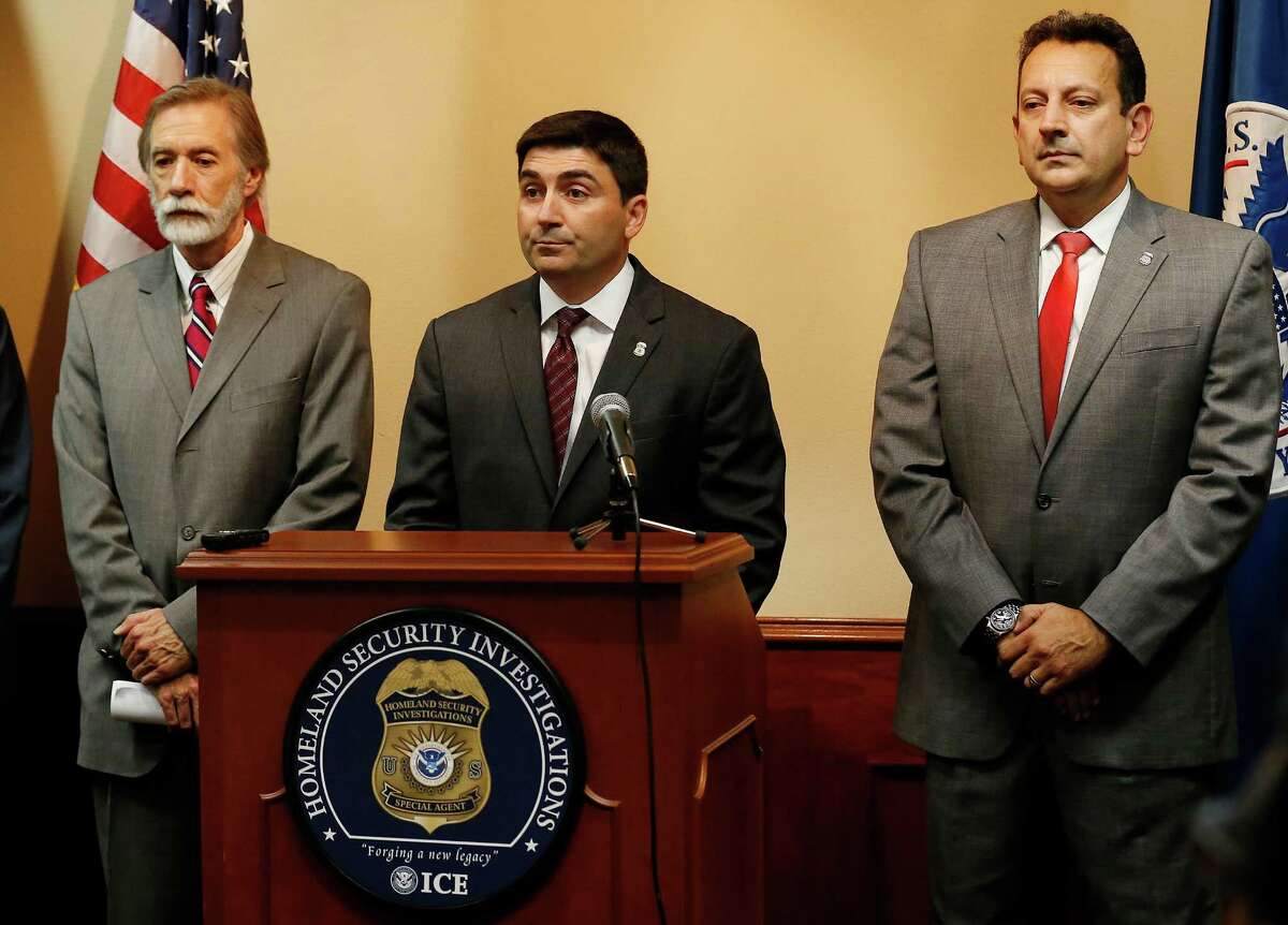 United States Attorney Richard Durbin, Jr. (from left), Homeland Security Special Agent in Charge James Spero and Deputy Special Agent in Charge Aristides Jimenez announce the arrests of 25 individuals indicted for their roles in a human smuggling operation within the state on Thursday, July 30, 2015. Operation Project 83 was a two-year-long investigation that focused on the illegal activity of alien smuggling into the United States. The operation garnered over 400 arrests, seized $187,000, three fire arms and 19 vehicles. Homeland Security credits the collaboration with multiple law enforcements agencies in the results of the arrests and indictments. (Kin Man Hui/San Antonio Express-News)