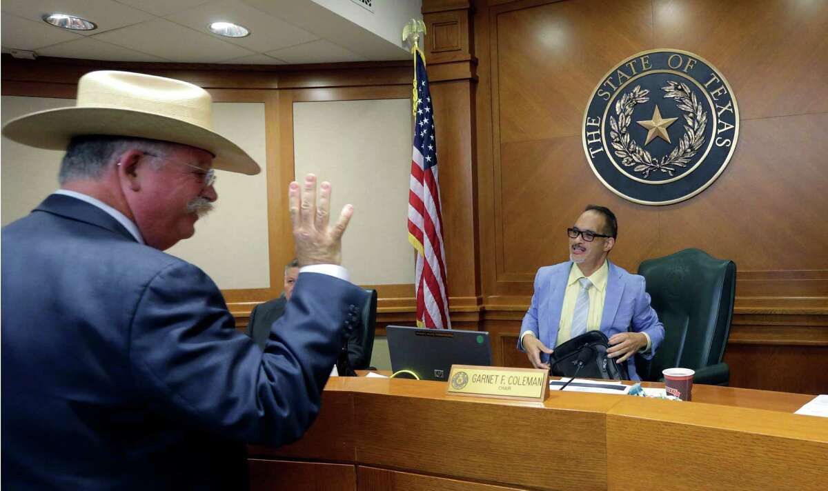 In the wake of Sandra Bland's jailhouse death, Victoria County Sheriff T. Michael O'Connor, left, greets Texas County Affairs Committee chairman Rep. Garnet F. Coleman ﻿to discuss jail standards on Thursday﻿ in Austin﻿. ﻿