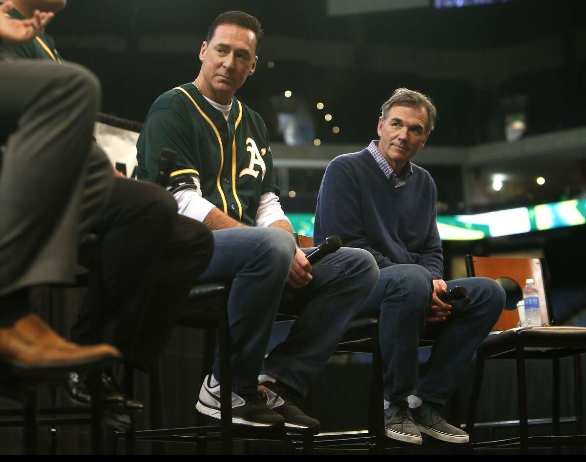 Oakland Athletics' Manager Bob Melvin and General Manager Billy Beane during a Q&A session during Fan Fest at Oracle Arena in Oakland, Calif. on Sunday, February 8, 2015.