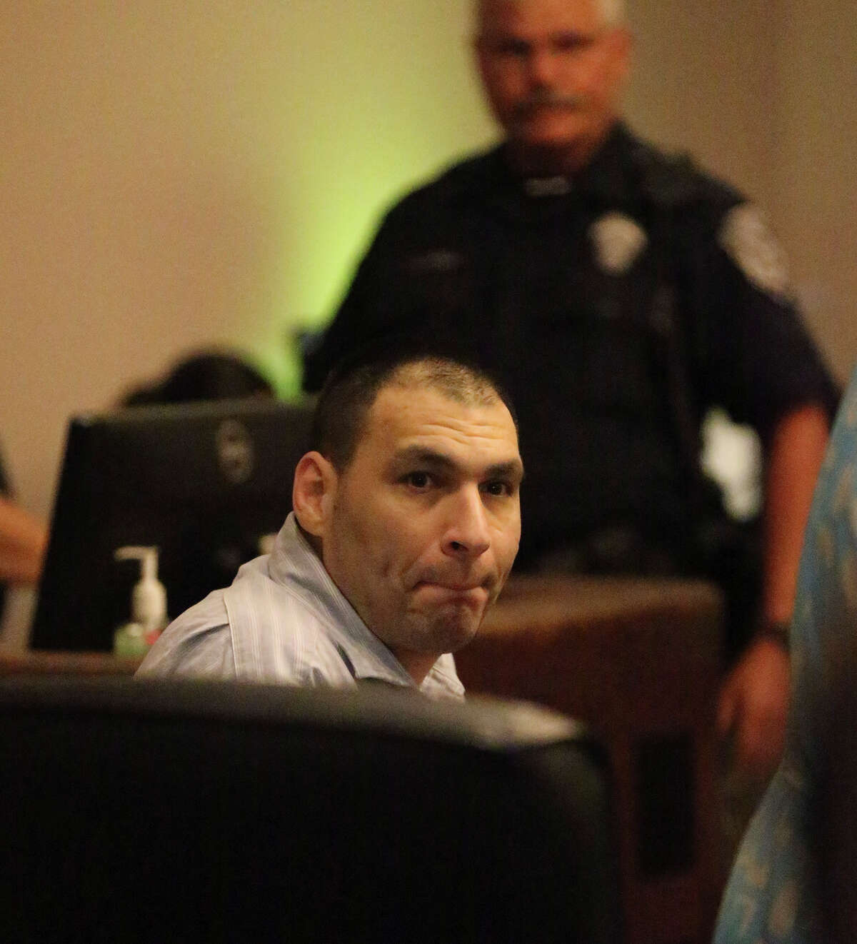 LEFT: Gonzalez awaits sentencing in the 144th state District Court. Gonzalez’s sentence falls between the minimum of 25 years and a 30-year plea offer he refused.