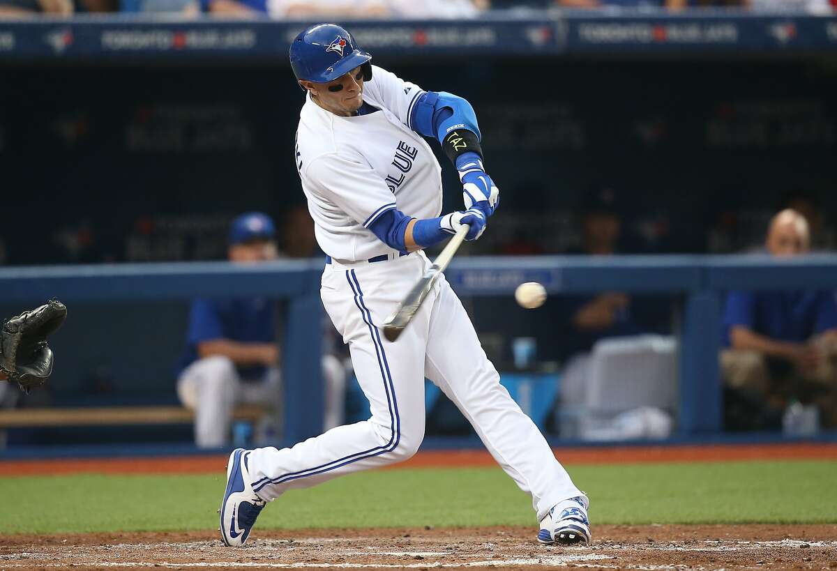 TORONTO, CANADA - JULY 29: Troy Tulowitzki #2 of the Toronto Blue Jays hits a double in the fifth inning during MLB game action against the Philadelphia Phillies on July 29, 2015 at Rogers Centre in Toronto, Ontario, Canada. (Photo by Tom Szczerbowski/Getty Images)