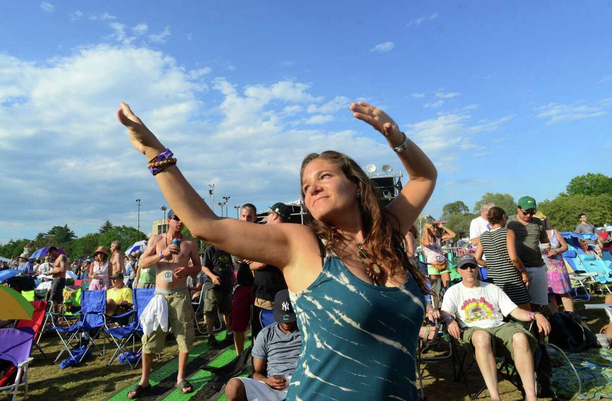Monet Mindell, of Woodmere, Long Island, dances at the 20th Annual Gathering of the Vibes at Seaside Park in Bridgeport, Conn., on Saturday August 1, 2015.