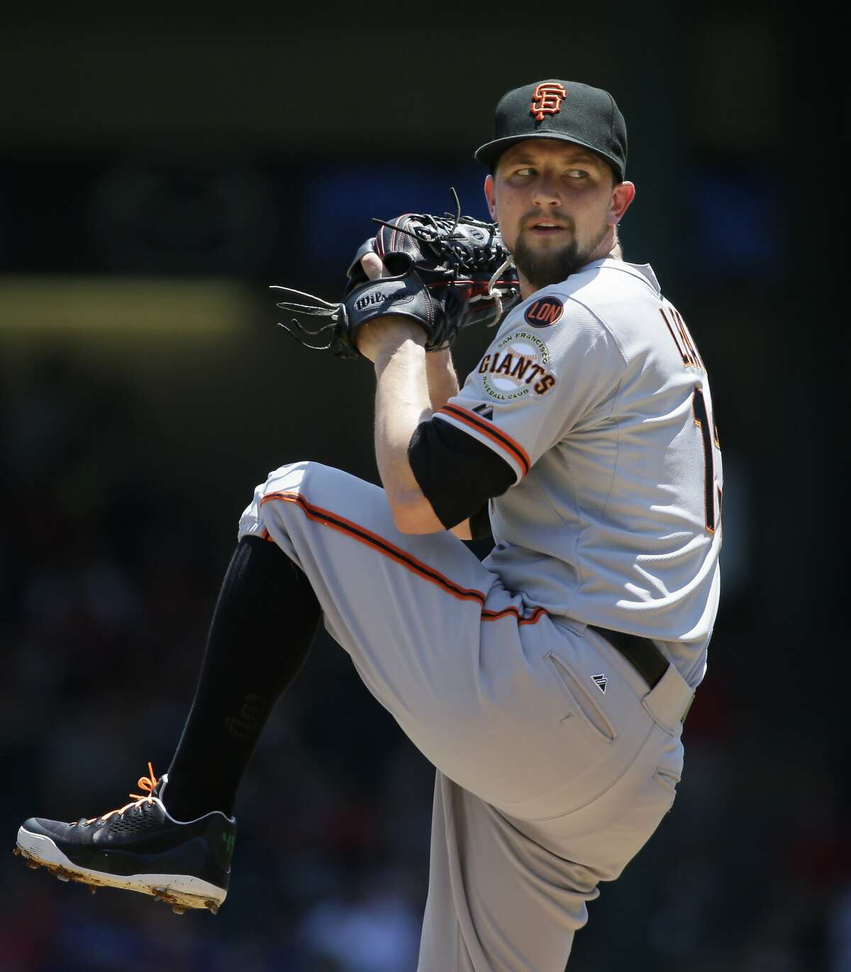 San Francisco Giants starting pitcher Mike Leake throws during the first inning of a baseball game against the Texas Rangers in Arlington, Texas, Sunday, Aug. 2, 2015. (AP Photo/LM Otero)
