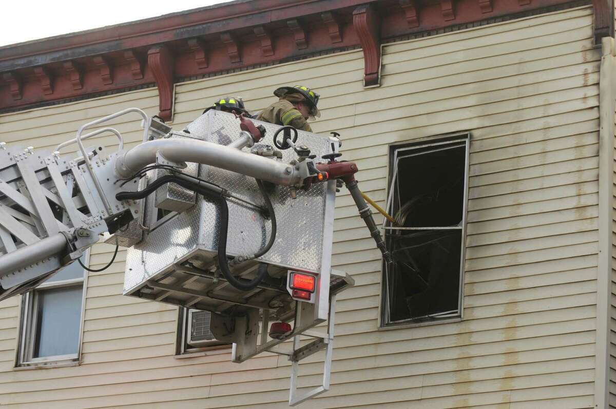Troy building a total loss after fire displaces 7