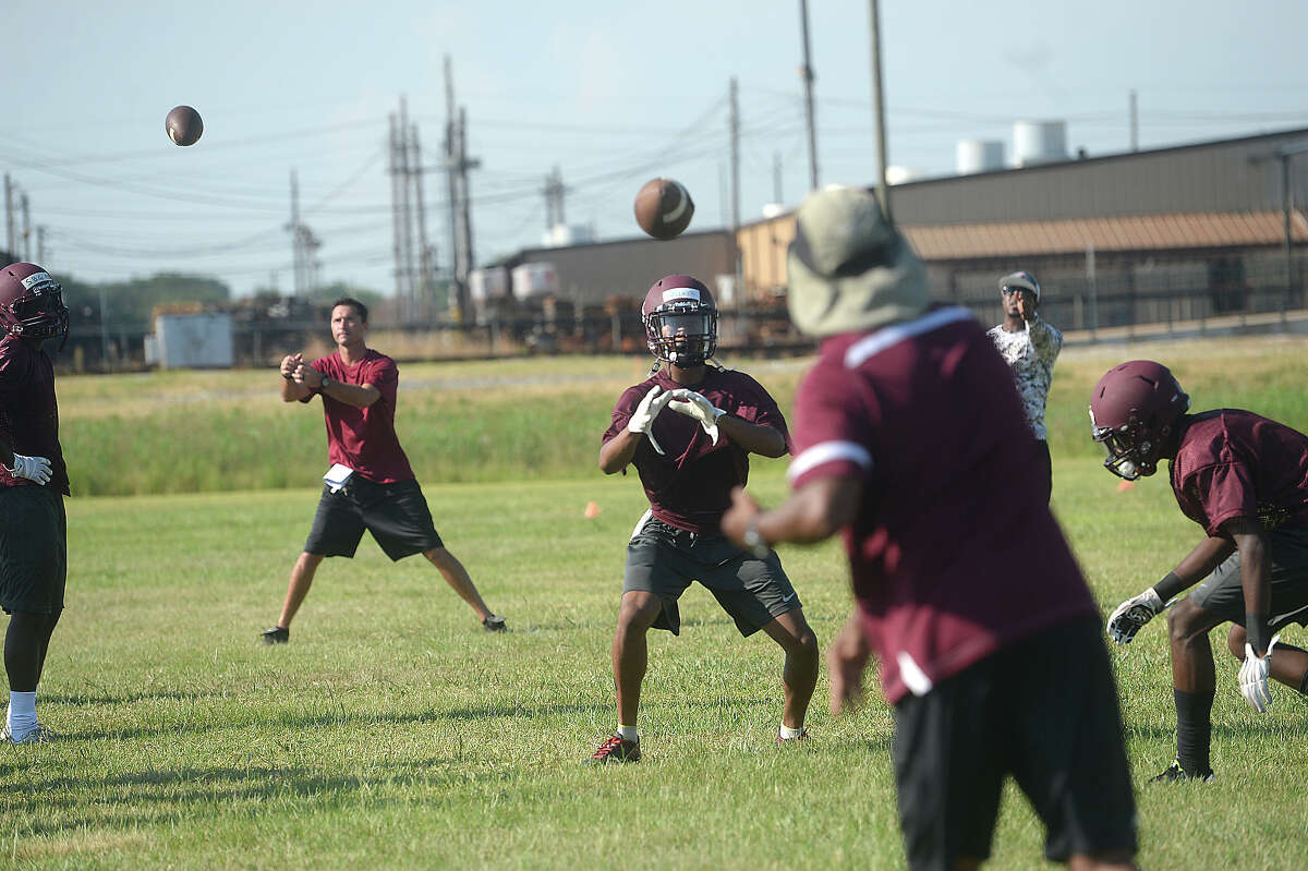 Central High School runs drills as they get ready for the coming season on the opening day of football practice Monday. Photo taken Monday, August 3, 2015 Kim Brent/The Enterprise