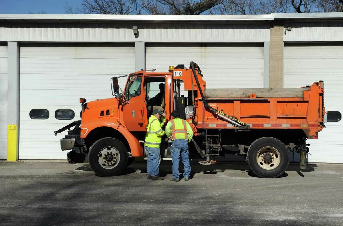 New Milford Department of Public Works began resurfacing of Grove Street on Tuesday.