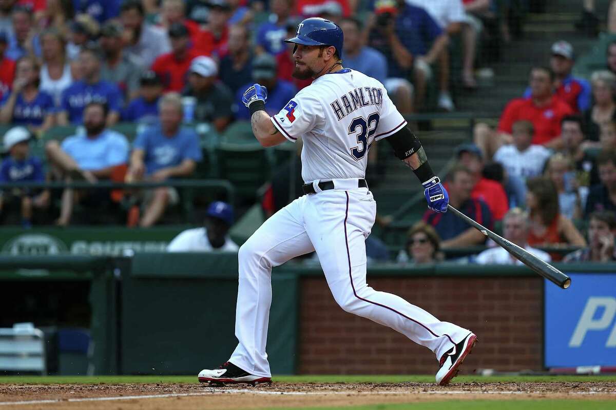 ARLINGTON, TX - AUGUST 04: Josh Hamilton #32 of the Texas Rangers hits a single in the second inning during a game against the Houston Astros at Globe Life Park in Arlington on August 4, 2015 in Arlington, Texas.