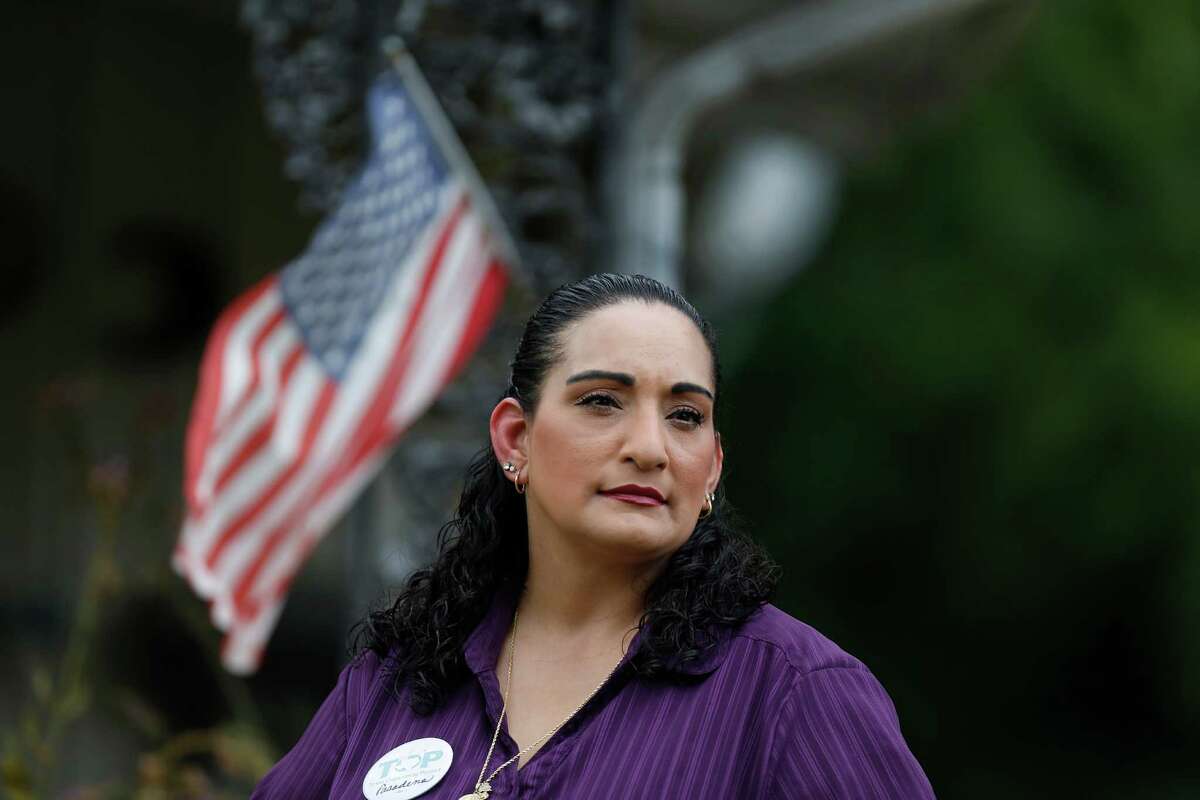 Patricia Gonzales has two small American flags in front of her Pasadena home. She has been involved in ongoing battles surrounding voting rights. One challenges Pasadena's 3-year-old system for electing city council candidates, which some contend dilutes the political influence of the city's growing Hispanic population. 