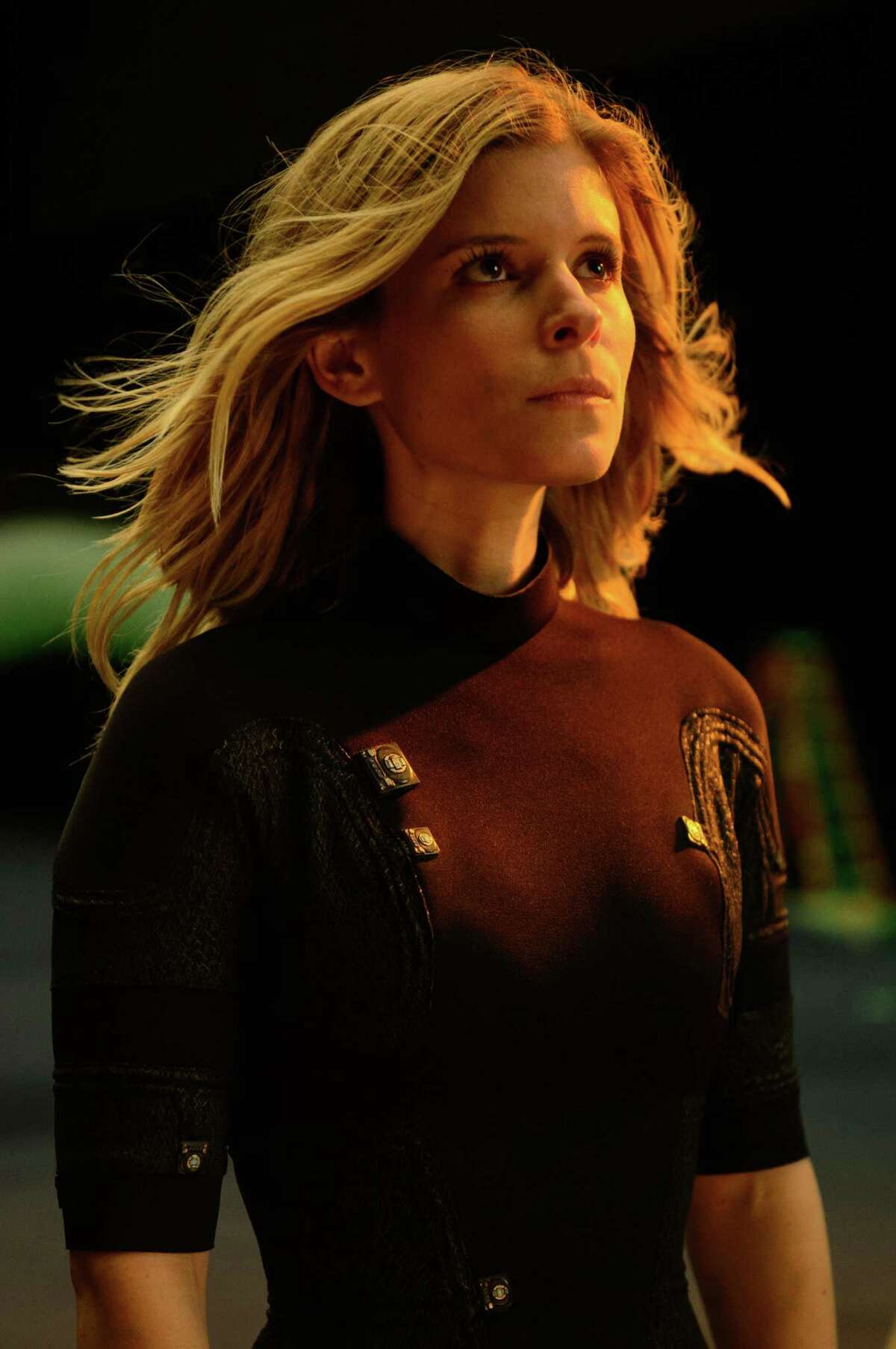This photo provided by Twentieth Century Fox shows, Kate Mara, as Sue Storm, in a scene from the film, "Fantastic Four." The movie opens in U.S. theaters on Aug. 7, 2015. (Ben Rothstein/Twentieth Century Fox via AP)