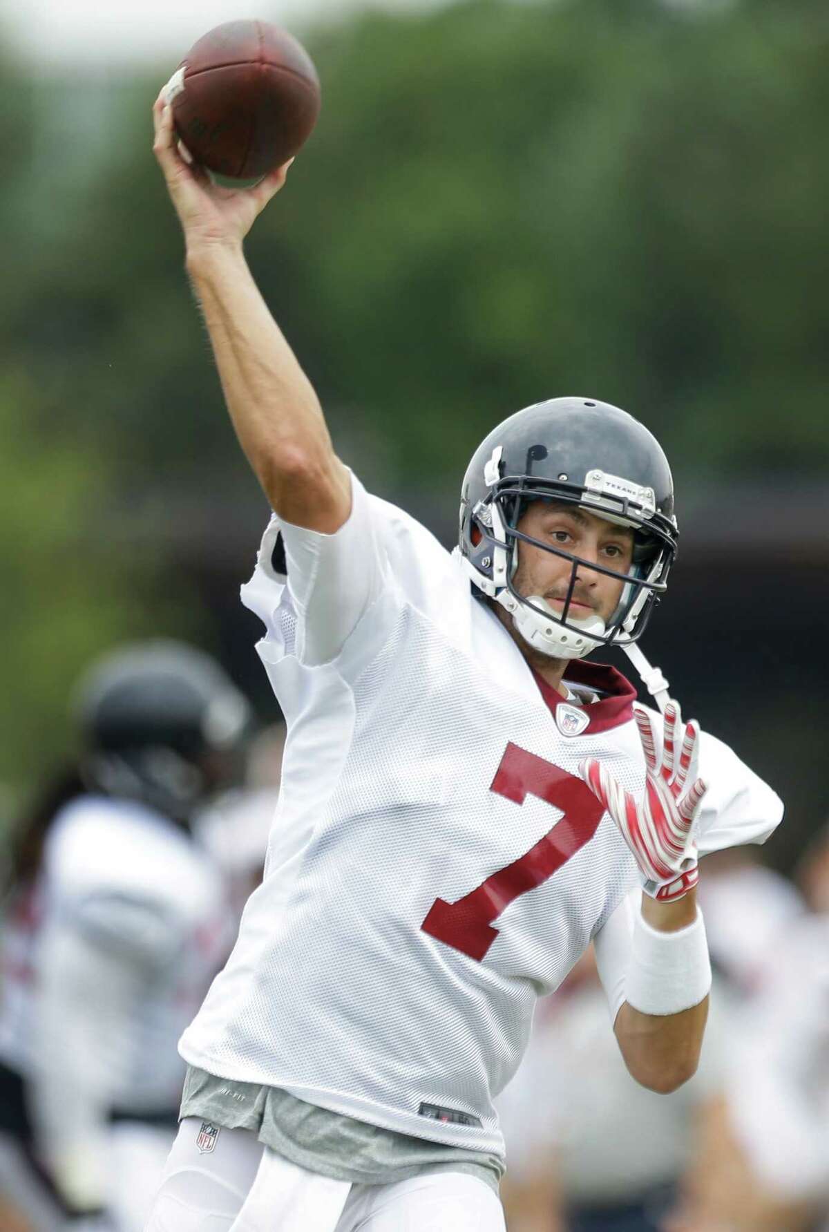 Houston Texans quarterback Brian Hoyer throws a pass during Texans training camp with the Washington Redskins at the Bon Secours Training Center on Thursday, Aug. 6, 2015, in Richmond, Va.