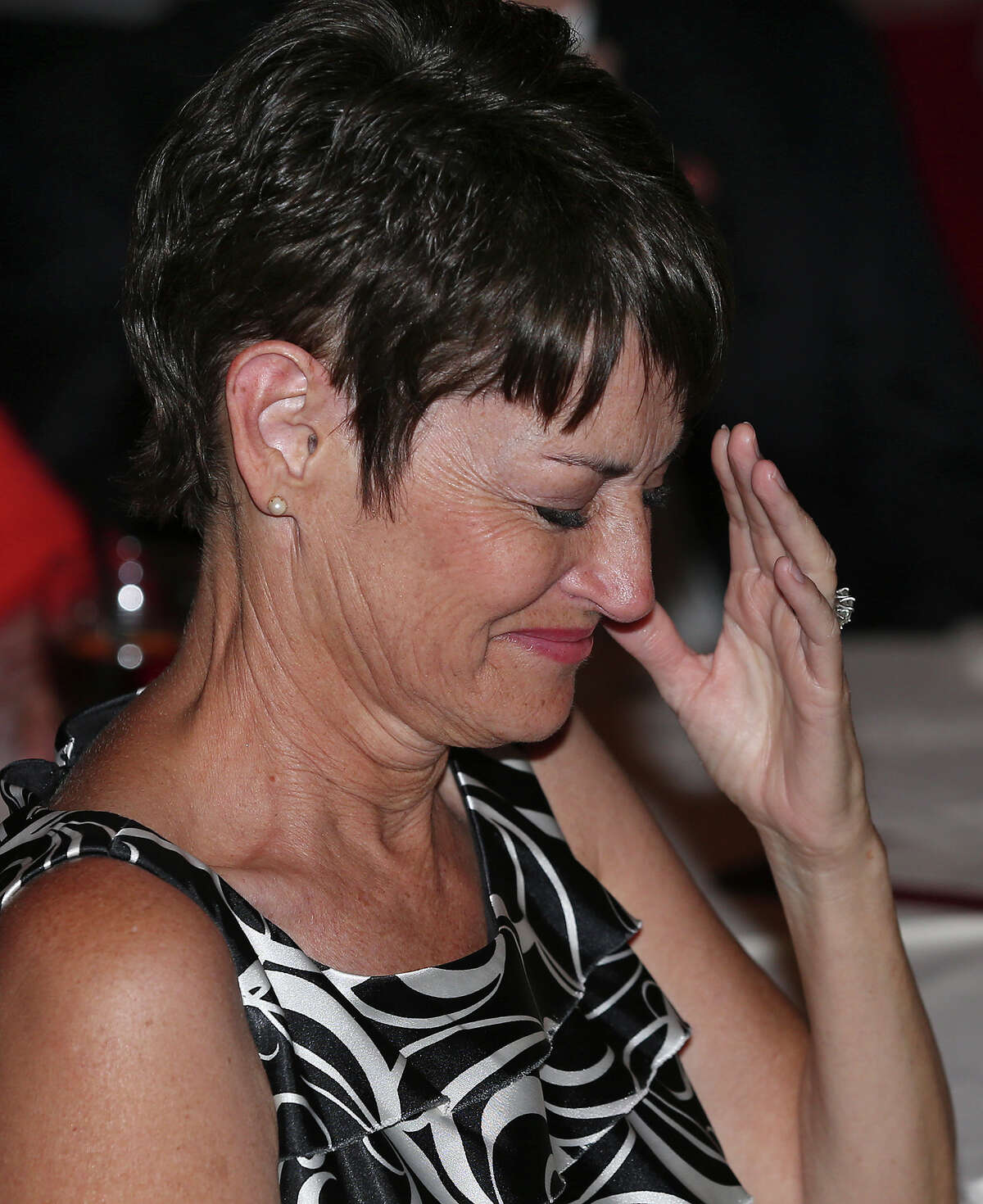 State Senator Donna Campbell grimaces at a response offered by Donald Trump during the GOP debate watch party at Maggiano's Little Italy on August 6, 2015.