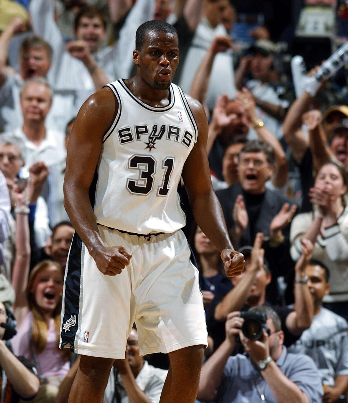 Spurs’ Malik Rose reacts after scoring during the third quarter in game two of the Western Conference Finals at the SBC Center on May 21, 2003. The Spurs beat the Dallas Mavericks 119-106.