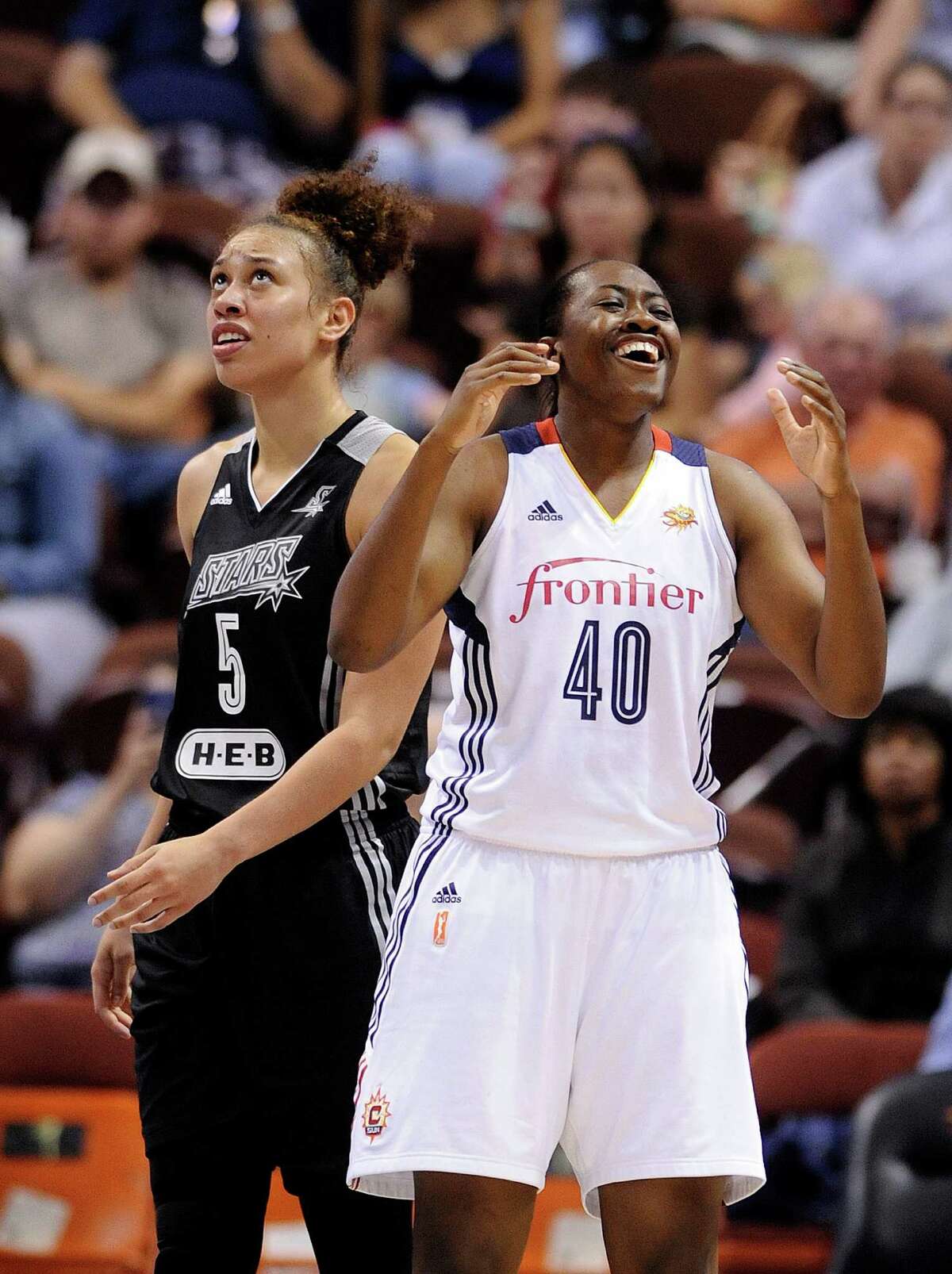 Connecticut Sun’s Shekinna Stricklan (40) reacts to a call as San Antonio Stars’s Dearica Hamby (5) looks at the scoreboard late in the second half of Connecticut’s 82-51 victory in a WNBA basketball game in Uncasville, Conn., on Tuesday, Aug. 4, 2015.