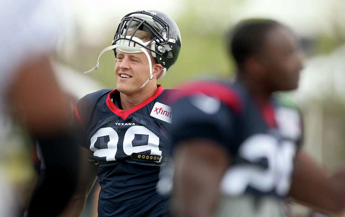 Houston Texans’ J.J. Watt gets ready for practice at an NFL training camp Thursday, Aug. 6, 2015, in Richmond, Va. The Washington Redskins and Houston Texans begin three days of joint workouts at the Redskins’ training complex.
