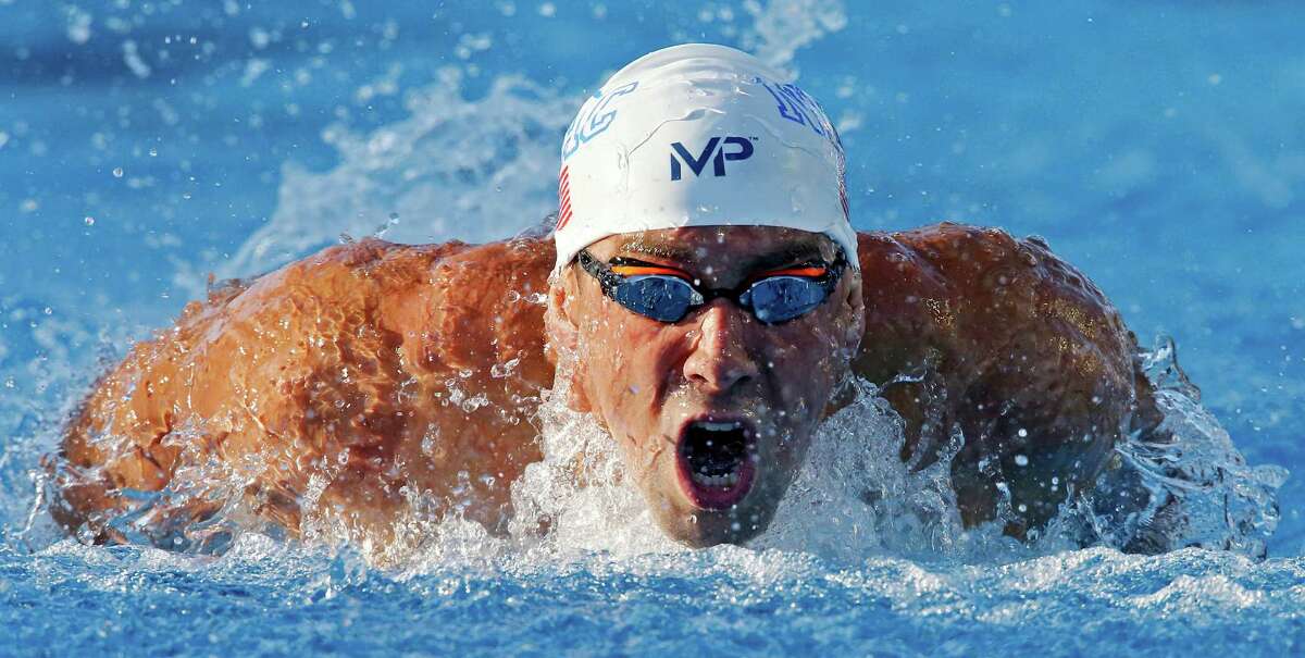 Michael Phelps competes in the men's 200-meter butterfly during the 2015 Phillips 66 National Championships held Friday Aug. 7, 2015 at the Northside Swim Center. Phelps finished first with a time of 1:52.94.