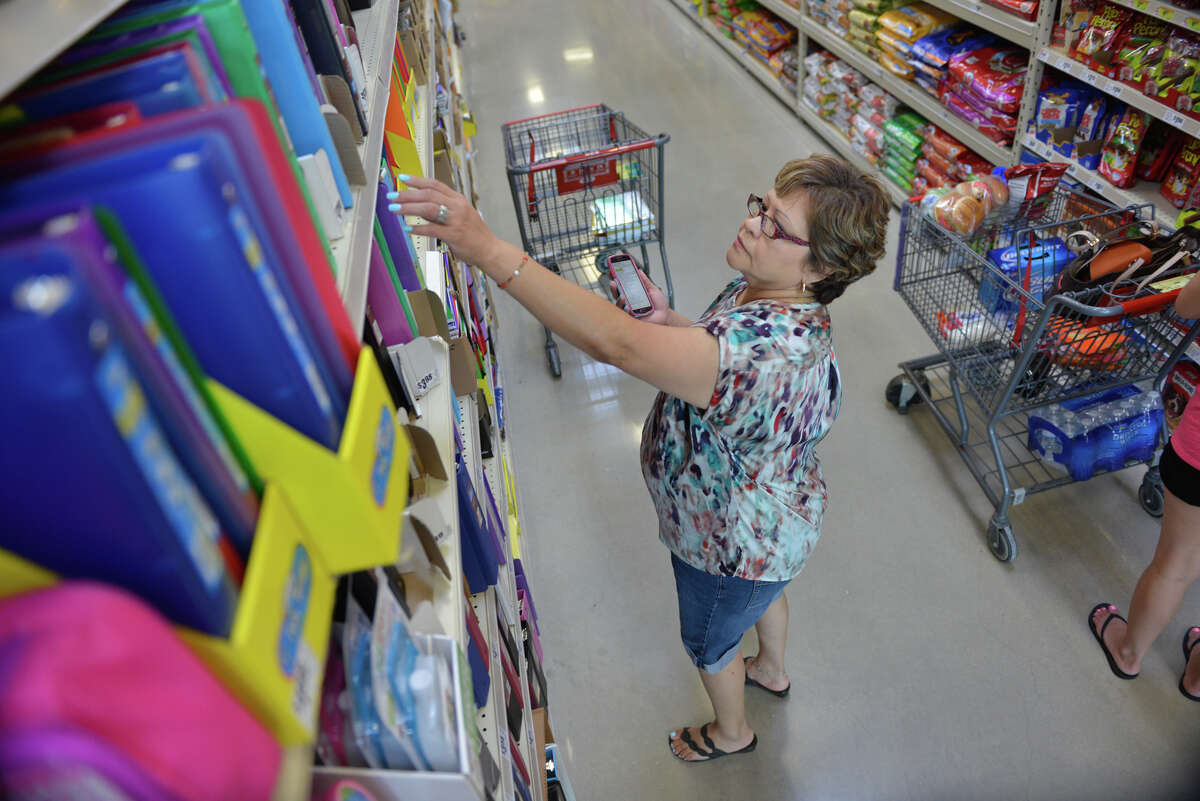 Janie Barragan does some school supply shopping for her grandchildren at a West Side H-E-B on Aug. 8. Texas sales tax revenue in the retail sector increased in August compared to the year before.