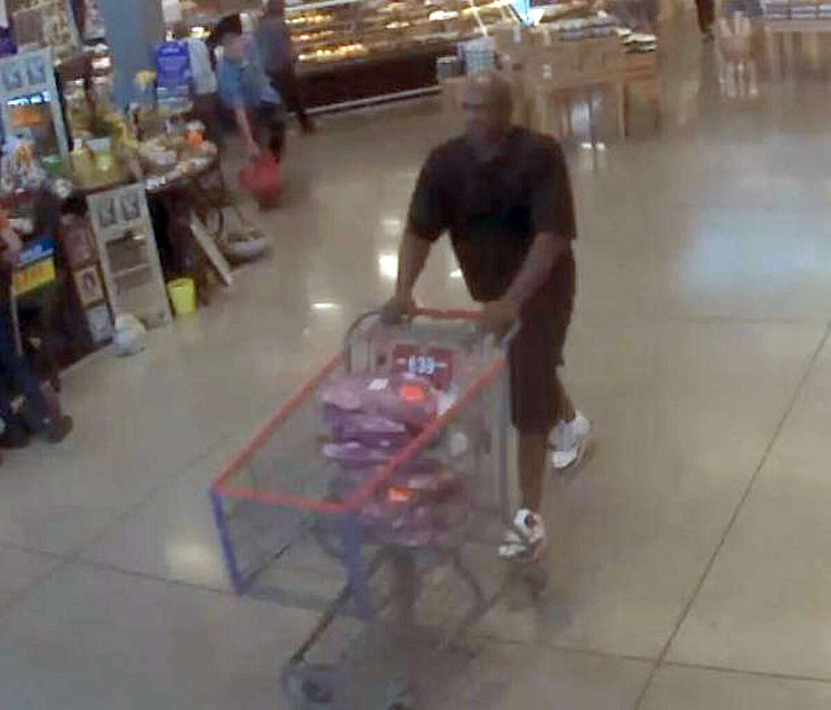 Police believe footage shows James Cordell Avery pushing a cart full of meat through a grocery store.