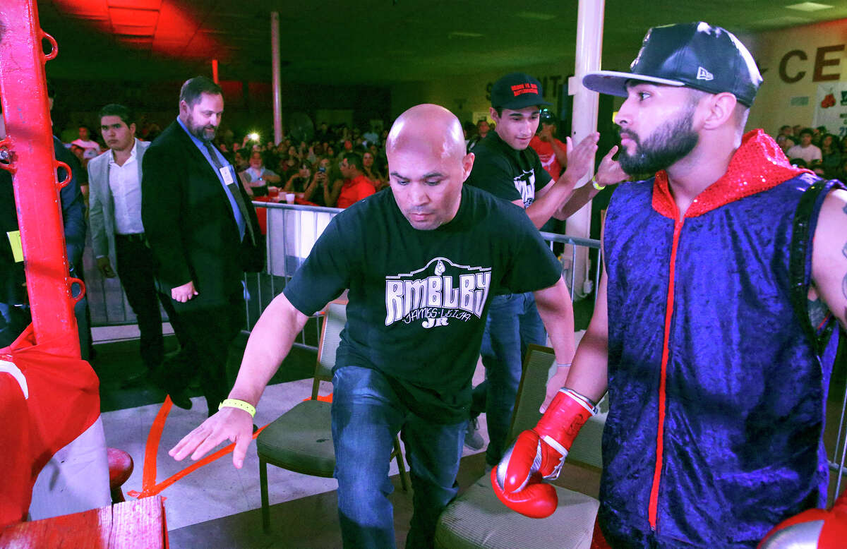 Jesse” James Leija climbs into the ring ahead of his son James Leija Jr., who made hist pro boxing debut against Cesar Martinez at the San Antonio Event Center on Aug. 8, 2015.