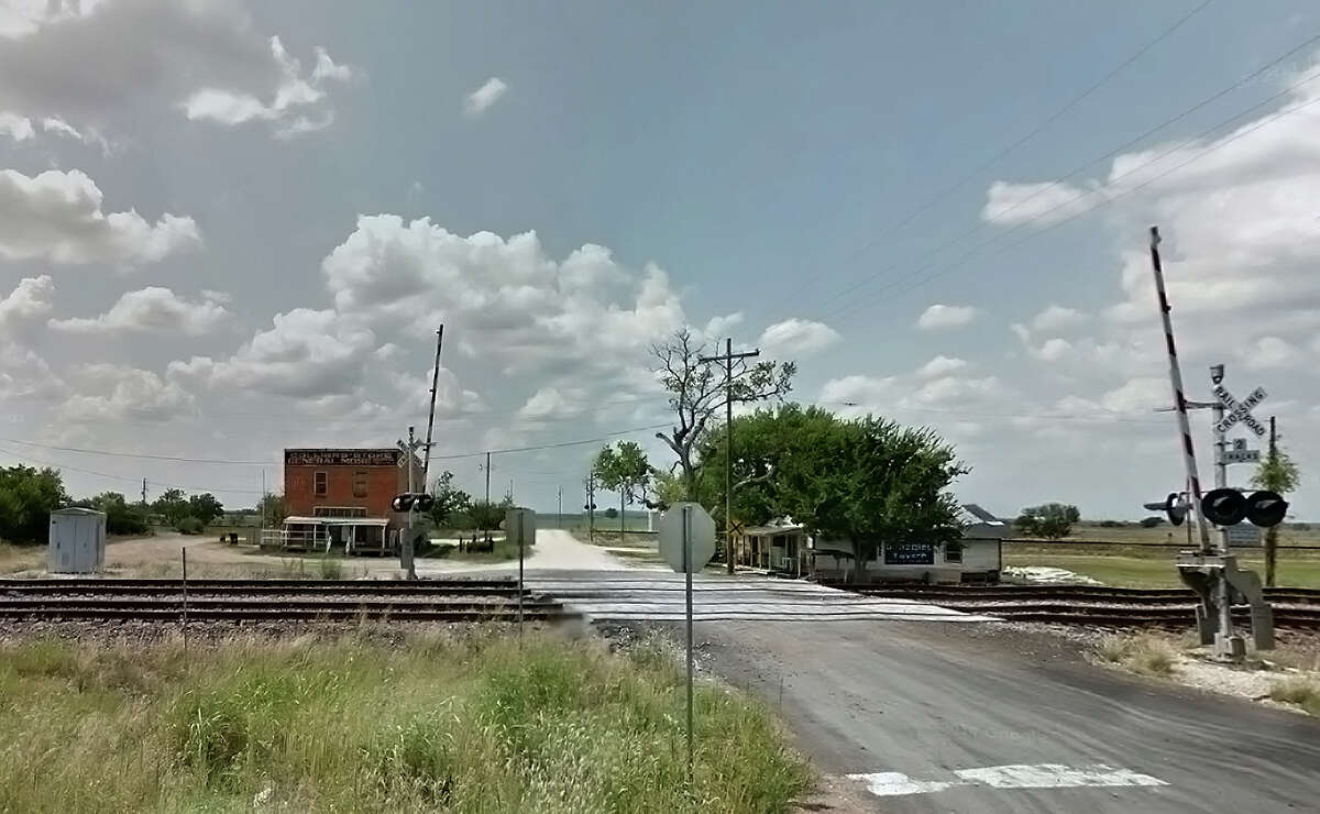 A composite Google Street View image shows Mumford, northeast of College Station. Union Pacific aims to build a rail yard here, but a few landowners continue to hold out on selling to UP.