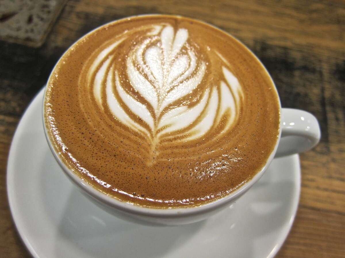 A flat white espresso drink from Greenway Coffee. 