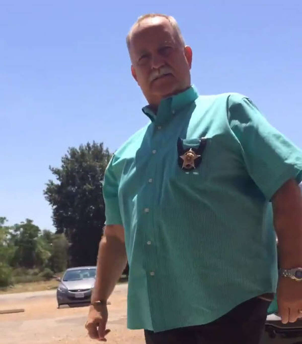 Houston clergy member Hannah Adair Bonner tweeted a video of Waller County Sheriff Glenn Smith suggesting she return to her "church of Satan" during a Monday protest in Waller County over the death of Sandra Bland.