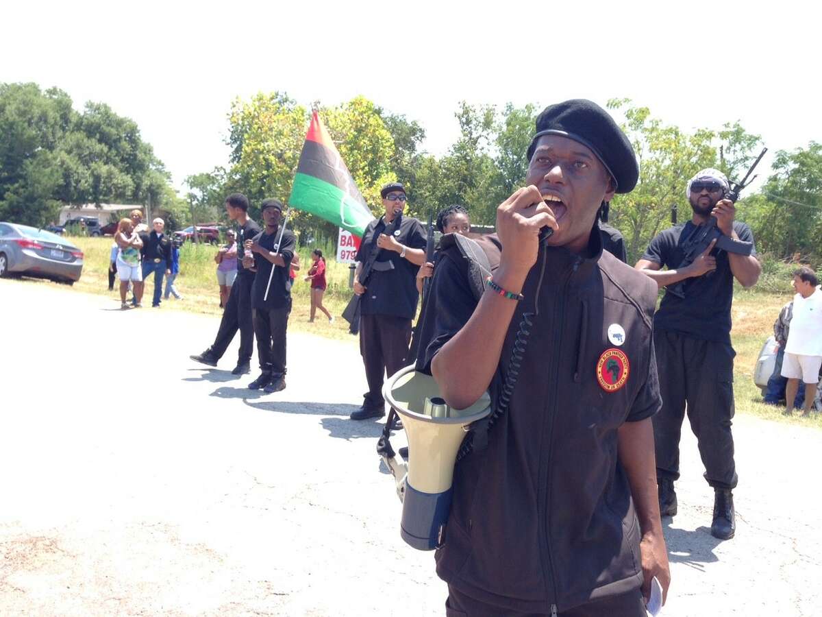 Black Panthers protest in front of the Waller County Sheriff's jail on Wednesday, Aug. 12, 2015.