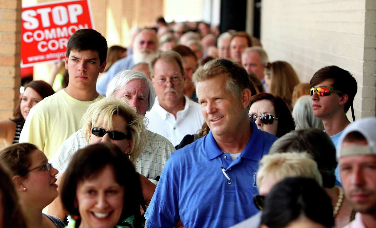 People wait outside on Tuesday, Aug. 11, 2015, for an opportunity to hear presidential candidate Ted Cruz address supporters in Olive Branch, Miss. Cruz, the junior senator from Texas, appeared at Sweetpea’s Table, an Olive Branch restaurant, at noon. He began the day with an appearance in Tupelo, Mississippi. (Stan Carroll/The Commercial Appeal via AP)