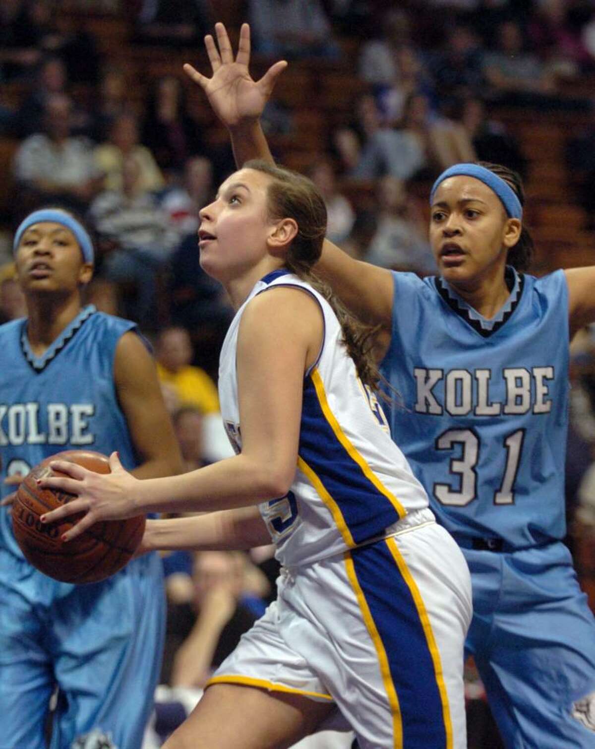 Kolbe Cathedral builds early lead, cruises to M title