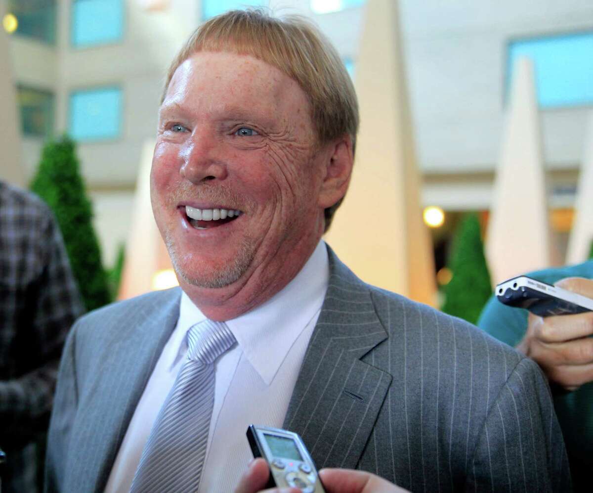 Oakland Raiders owner Mark Davis laughs while responding to a question from a reporter at the NFL owners meetings at the Hyatt Regency Hotel, Tuesday, Aug. 11, 2015, in Schaumburg, Ill.