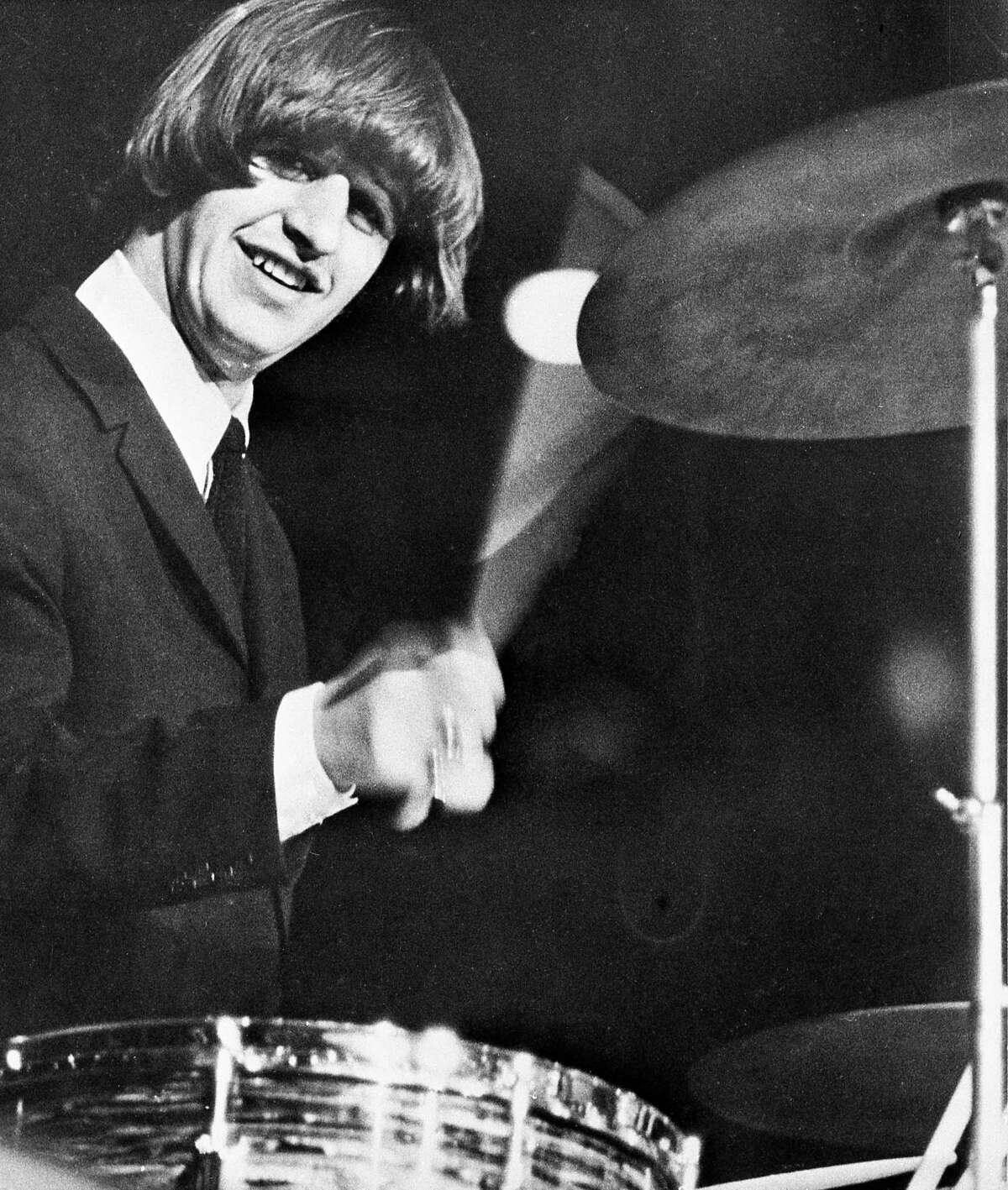 Fan celebrates solid-gold anniversary of Beatles' Houston concert