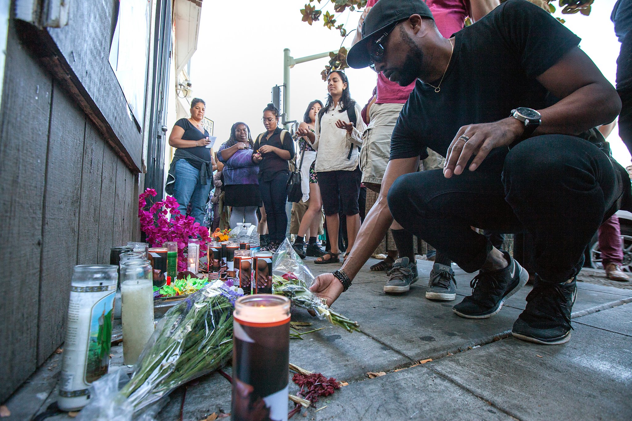 Calls for justice at vigil for man killed by police