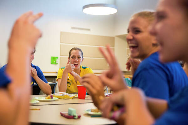 Deaf Competitive Swimmers Share Tips With Students At Sunshine