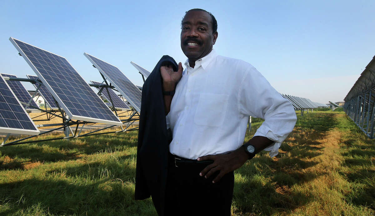 CPS Energy CEO Doyle Beneby stands Thursday August 13, 2015 at the OCI Solar Power Alamo 2 solar farm on Binz-Engleman Road. Beneby has pushed the city-owned utility toward using cleaner energy sources and is resigning effective September 30. Beneby has headed CPS since August 2010.