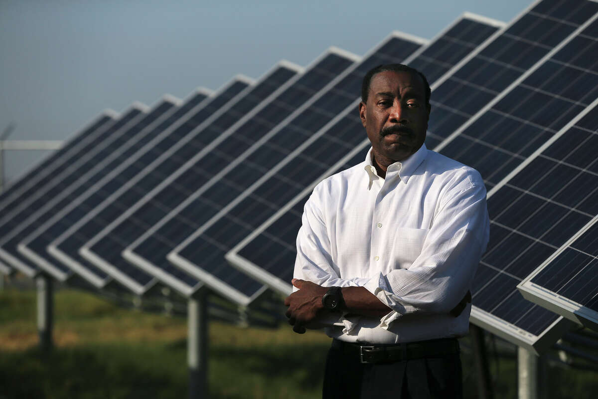 CPS Energy CEO Doyle Beneby stands Thursday August 13, 2015 at the OCI Solar Power Alamo 2 solar farm on Binz-Engleman Road. Beneby has pushed the city-owned utility toward using cleaner energy sources and is resigning effective September 30. Beneby has headed CPS since August 2010.