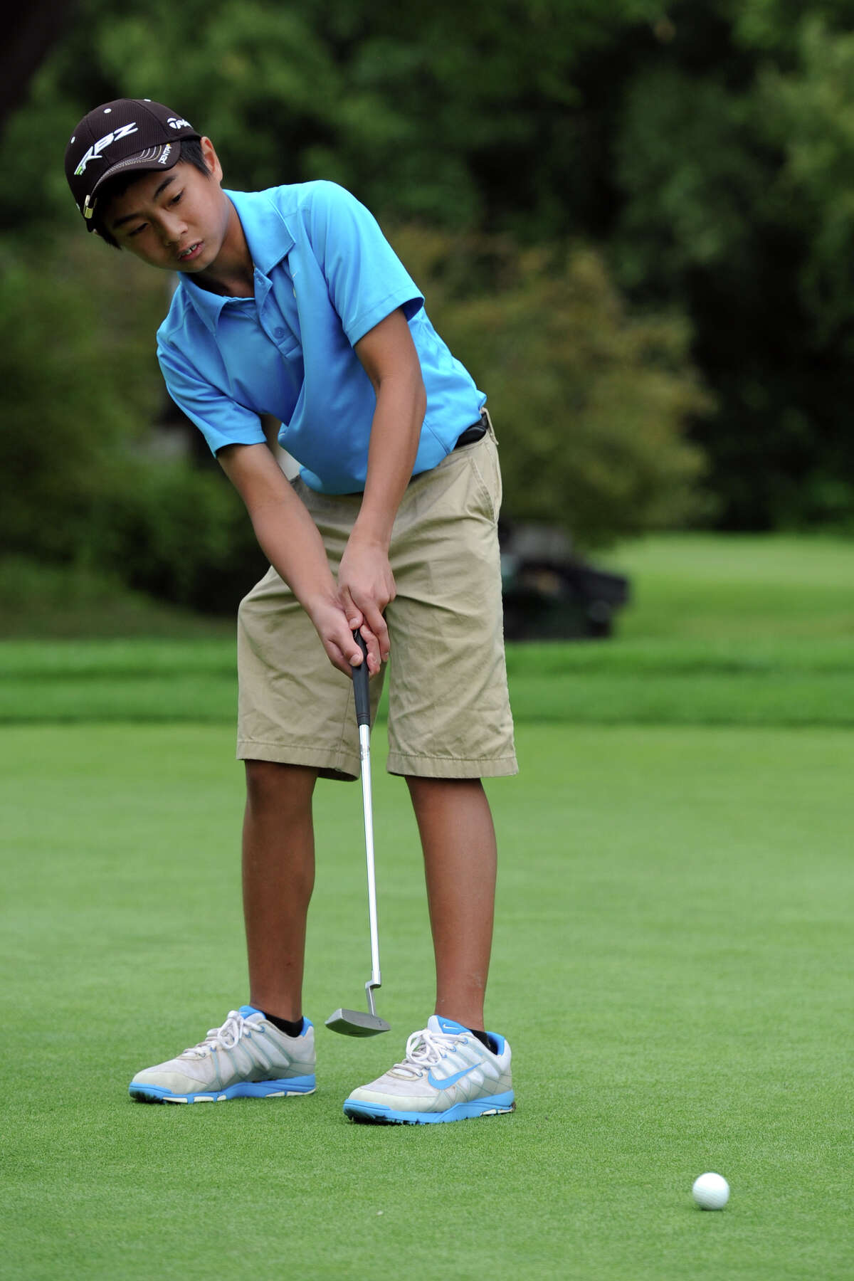 Ryan Mondonedo, of New Milford, putts during the Fran McCarthy Junior Golf Tournament at the Richter Park Golf Course, in Danbury, Conn. Aug. 18, 2014. Mondonedo is scheduled to compete in this year's event, set for Monday.